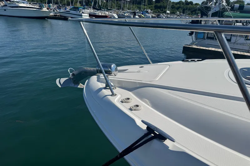  Yacht Photos Pics 2010 Sea Ray 370 Sundancer bow at marina, featuring sleek design and anchor.