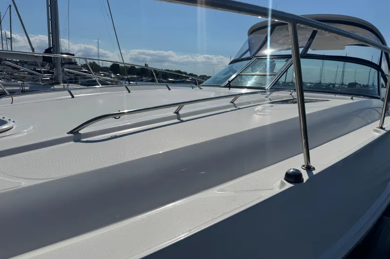  Yacht Photos Pics 2010 Sea Ray 370 Sundancer yacht deck with sleek design and stainless steel railings.