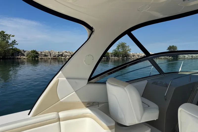  Yacht Photos Pics Interior view of 2010 Sea Ray 370 Sundancer boat with scenic water backdrop.