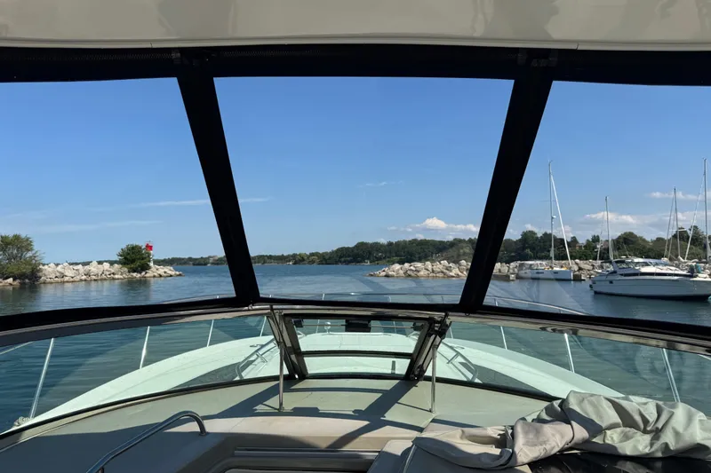  Yacht Photos Pics View from a 2010 Sea Ray 370 Sundancer boat, overlooking a serene marina.