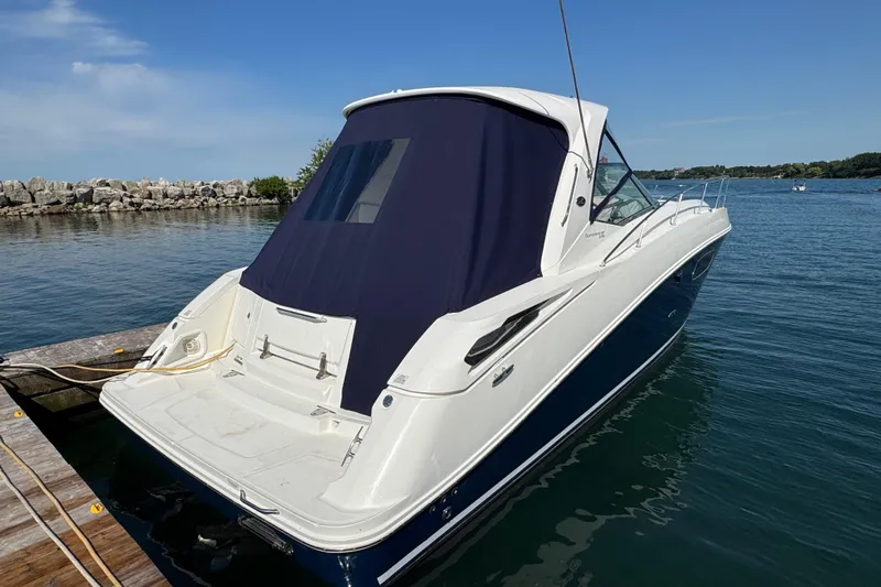  Yacht Photos Pics 2010 Sea Ray 370 Sundancer docked on a sunny day, rear view.