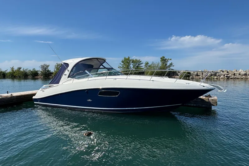  Yacht Photos Pics 2010 Sea Ray 370 Sundancer yacht docked on a sunny day.