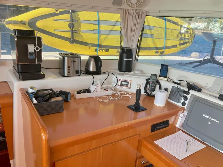 Kirlana Yacht Photos Pics Interior of 2006 Lagoon 420 yacht with kitchen appliances and navigation equipment.