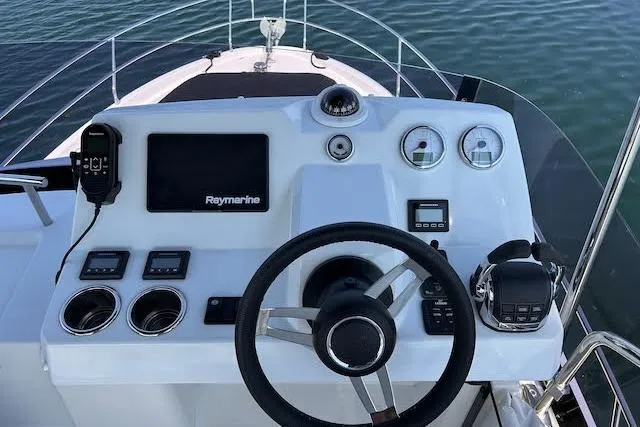  Yacht Photos Pics 2018 Jeanneau Velasco 37F boat helm with Raymarine navigation system.