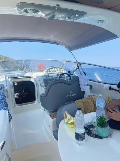  Yacht Photos Pics 2007 Cranchi Endurance 41 yacht interior with helm, seating, and ocean view.