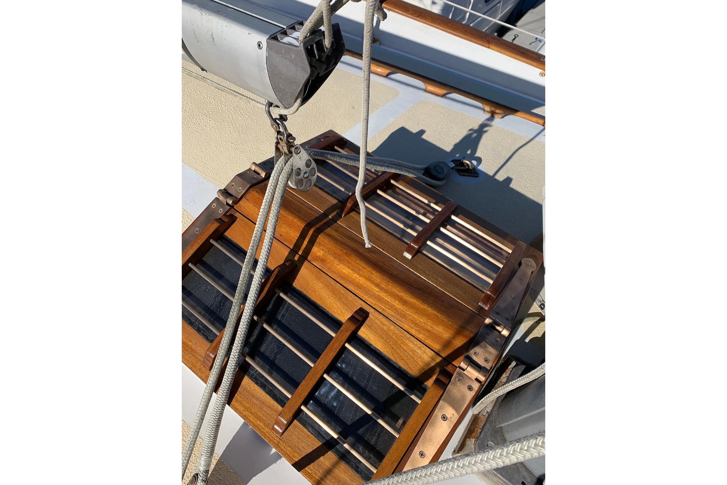 Wooden hatch and rigging on a 1981 Hardin 45 sailboat deck.