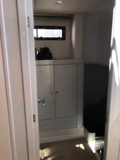  Yacht Photos Pics Interior cabin of 2016 Fjord Open 48 yacht with storage cabinet.