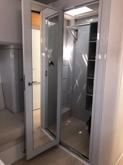  Yacht Photos Pics Interior of 2016 Fjord Open 48 yacht, featuring a modern shower and sleek design.