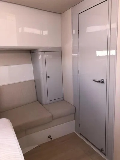  Yacht Photos Pics Interior of 2016 Fjord Open 48 yacht with sleek seating and storage.