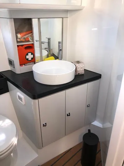  Yacht Photos Pics Modern bathroom in 2016 Fjord Open 48 yacht with sleek sink and storage.