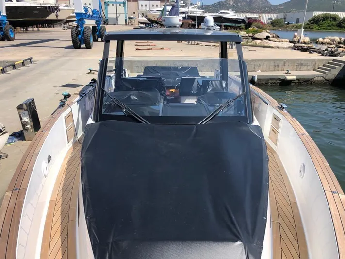  Yacht Photos Pics 2016 Fjord Open 48 yacht docked, featuring sleek design and spacious deck.