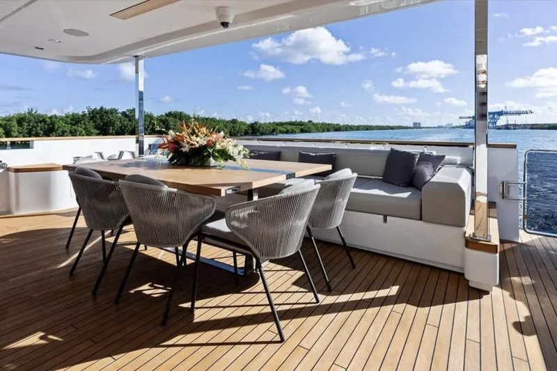 Tito El Patron Yacht Photos Pics TITO EL PATRON 121'6"/37.Custom Line Navetta 37  Aft Deck Dining