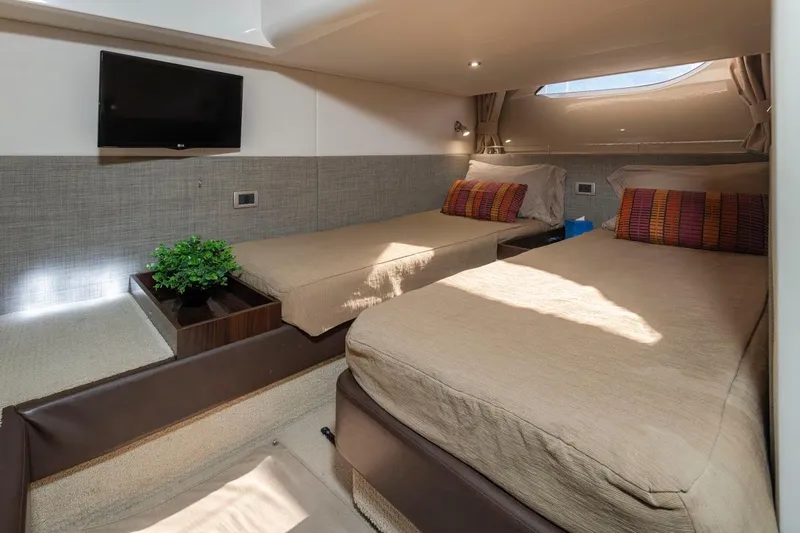 You Betcha Yacht Photos Pics Interior of 2016 Sea Ray 400 Sundancer with twin beds and modern decor.