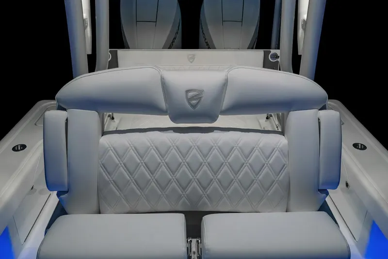  Yacht Photos Pics Luxurious interior of 2022 Barker Boatworks 26 Open, featuring elegant white seating.