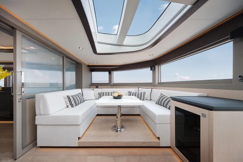 Seaview 75 Yacht Photos Pics Luxurious interior of 2026 Heysea Seaview 75 yacht with skylight and modern seating area.