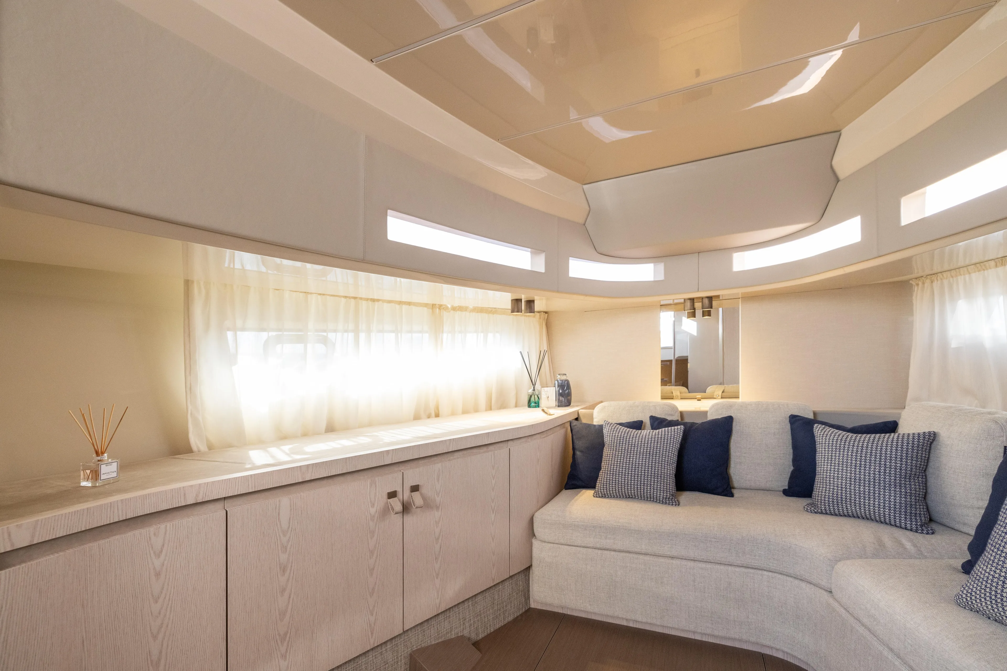  Yacht Photos Pics Luxurious interior of 2026 Invictus TT460 yacht with elegant seating and modern decor.