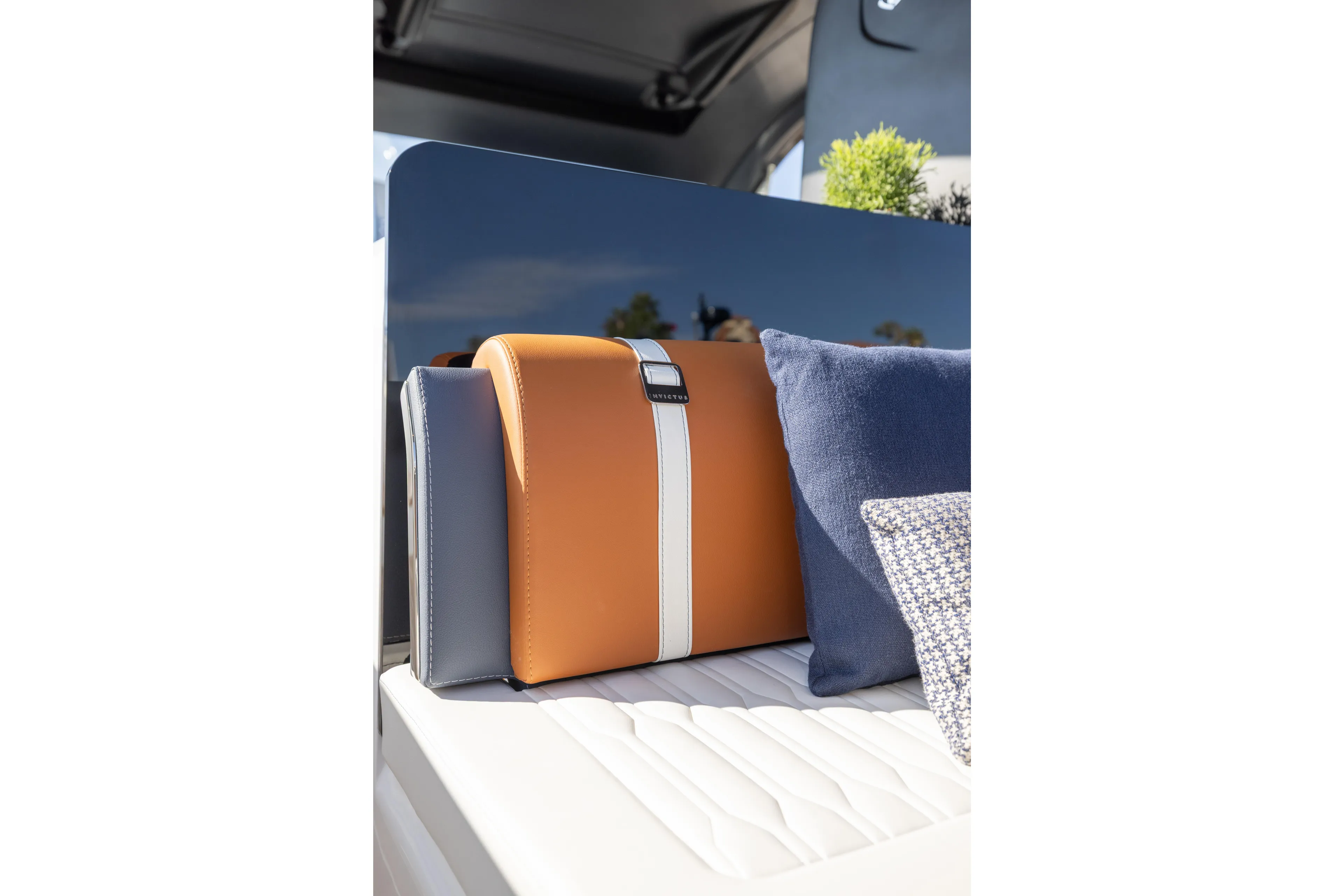  Yacht Photos Pics Luxurious seating on 2026 Invictus TT460 yacht with stylish cushions and leather accents.