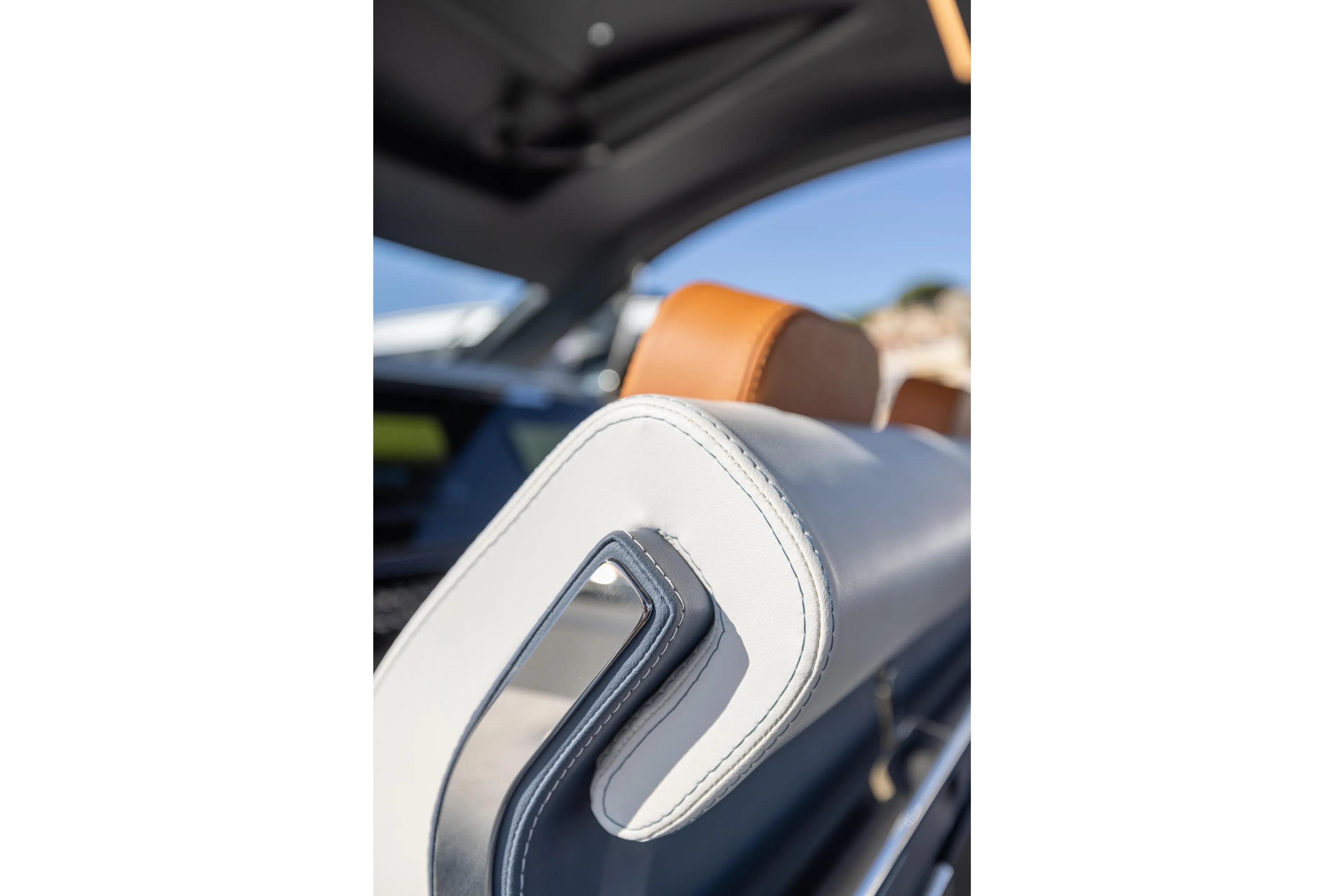  Yacht Photos Pics Luxurious interior of 2026 Invictus TT460 with elegant leather seating detail.