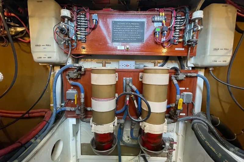 Huck Fin Yacht Photos Pics 1966 Huckins Sportsman engine room with wiring and components.