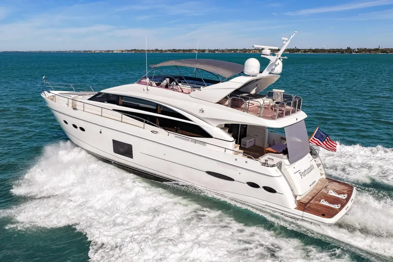 Fortunato Yacht Photos Pics Luxurious 2014 Princess Y72 yacht cruising on open water, displaying sleek design and elegance.