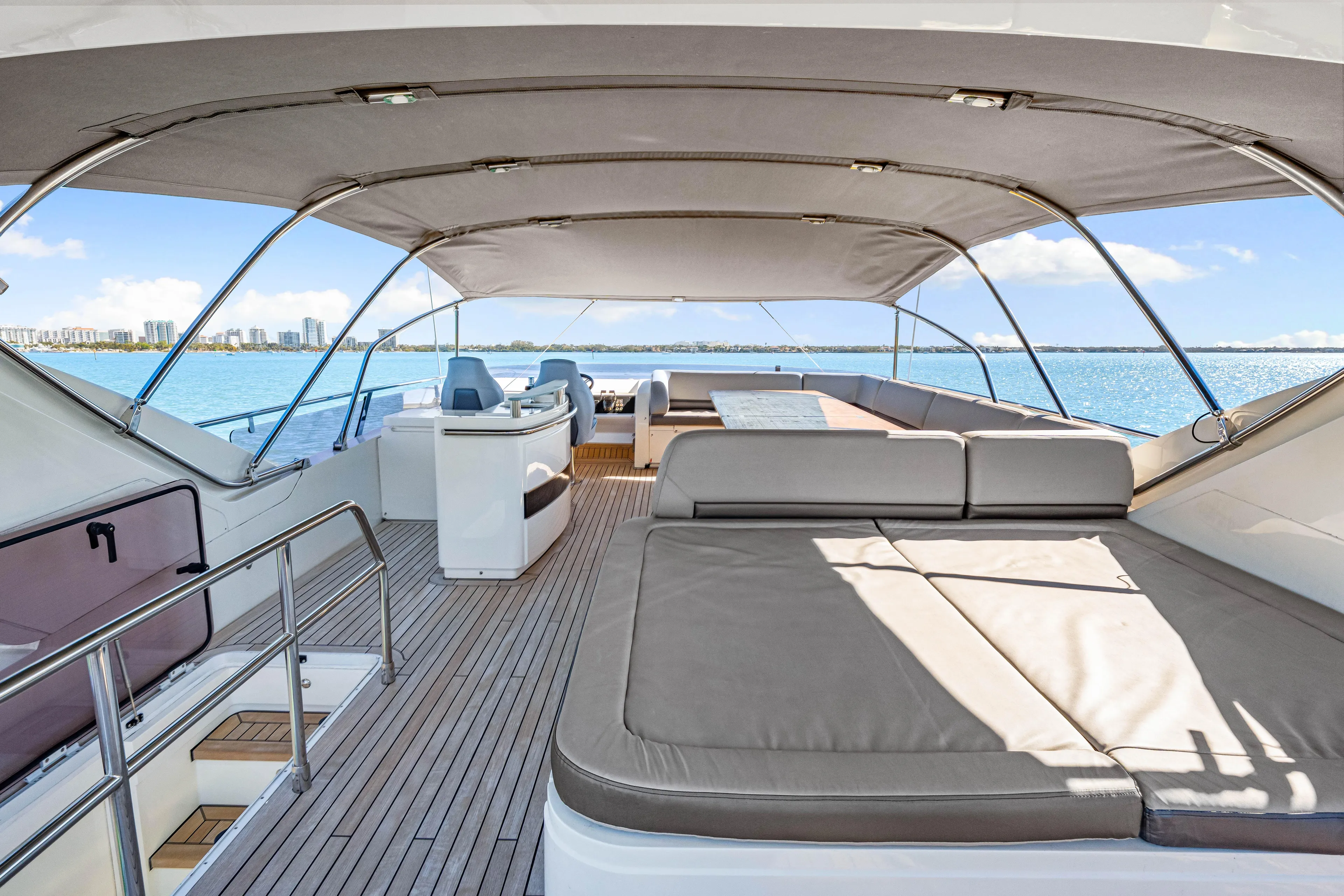 Fortunato Yacht Photos Pics Luxurious 2014 Princess Y72 yacht deck with seating, ocean view, and canopy.