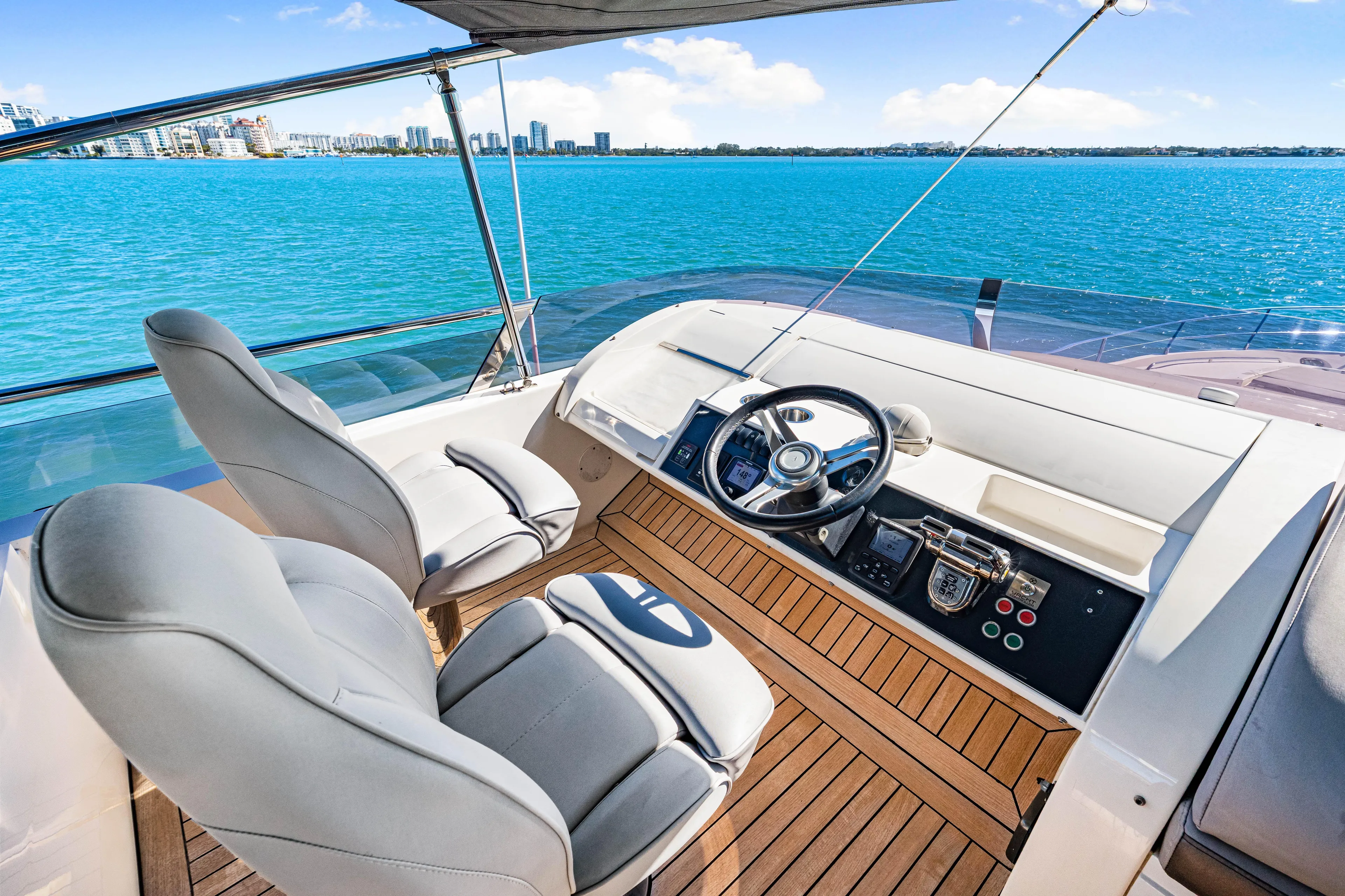 Fortunato Yacht Photos Pics Luxurious 2014 Princess Y72 yacht helm with ocean view and modern controls.