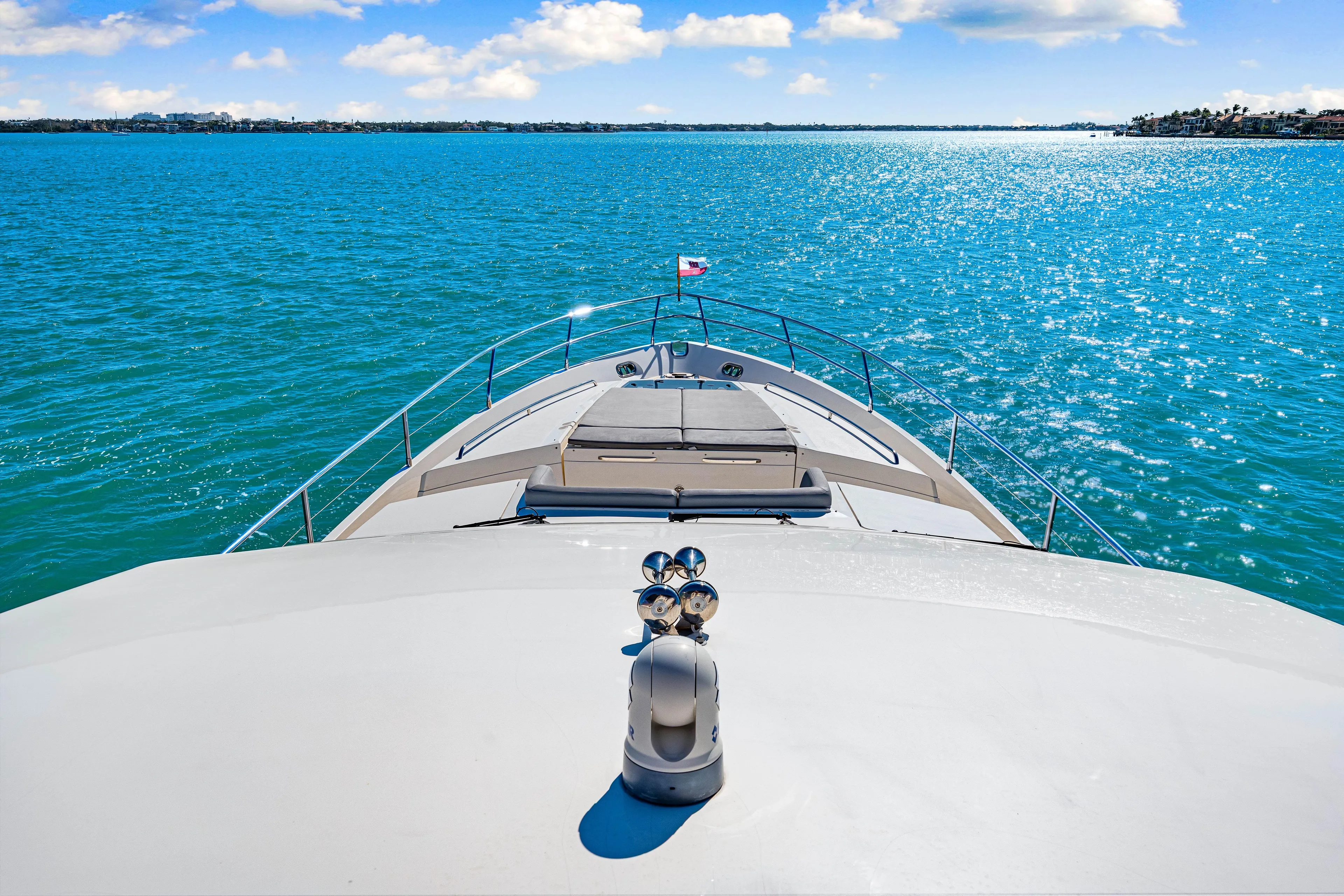 Fortunato Yacht Photos Pics Luxurious 2014 Princess Y72 yacht cruising on sparkling blue waters under a clear sky.