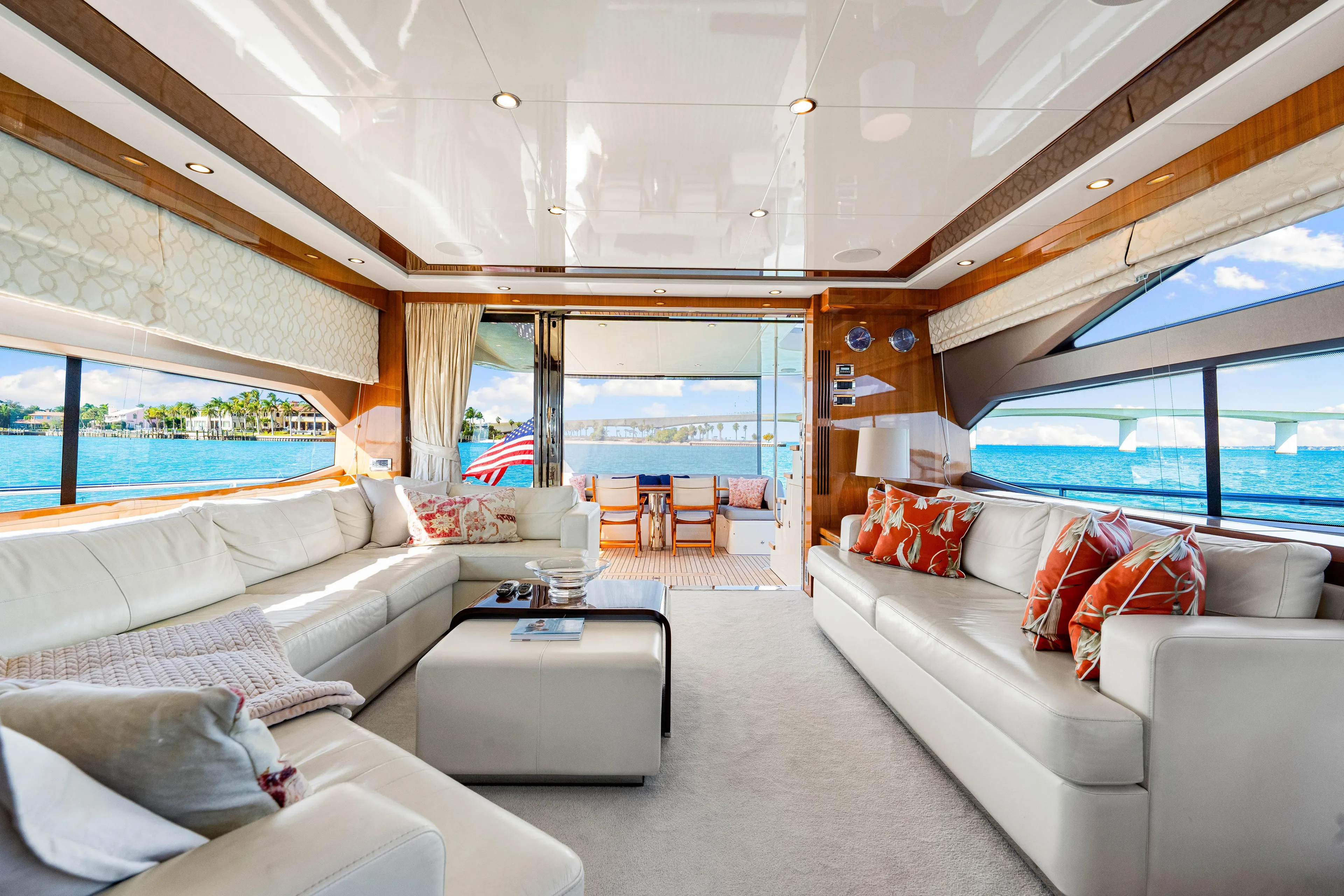 Fortunato Yacht Photos Pics Luxurious interior of 2014 Princess Y72 yacht with elegant white seating and ocean view.