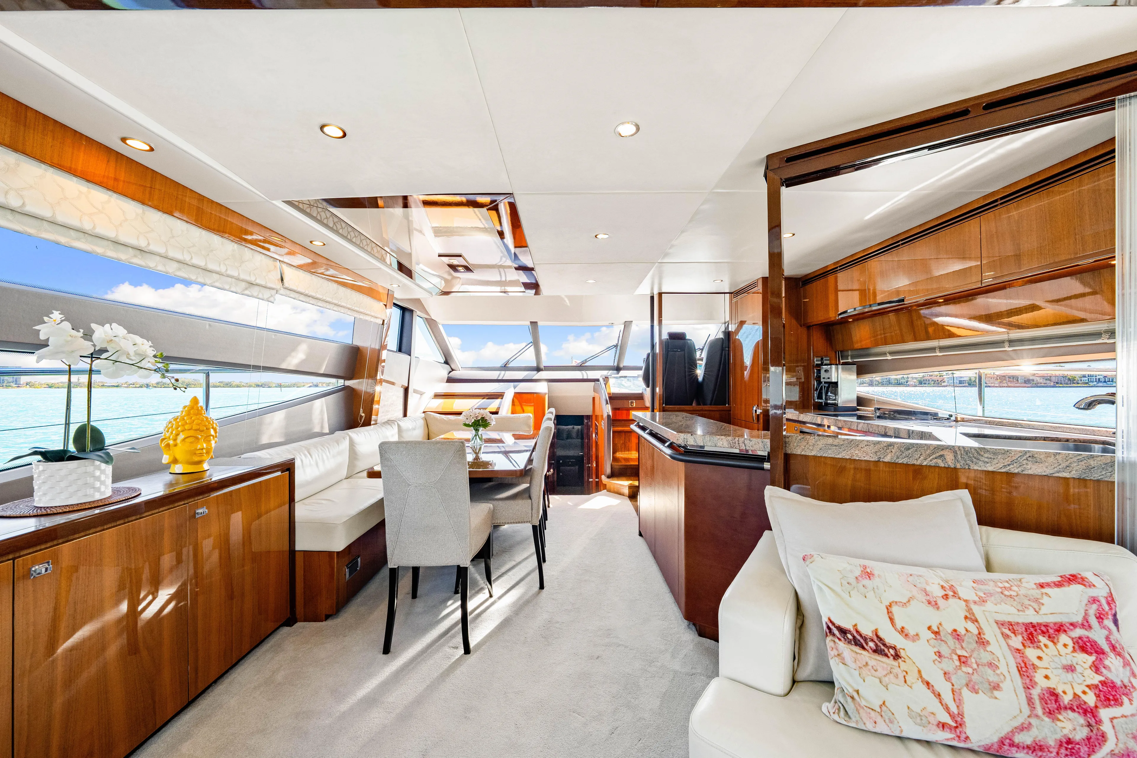 Fortunato Yacht Photos Pics Luxurious interior of 2014 Princess Y72 yacht with elegant furnishings and panoramic windows.