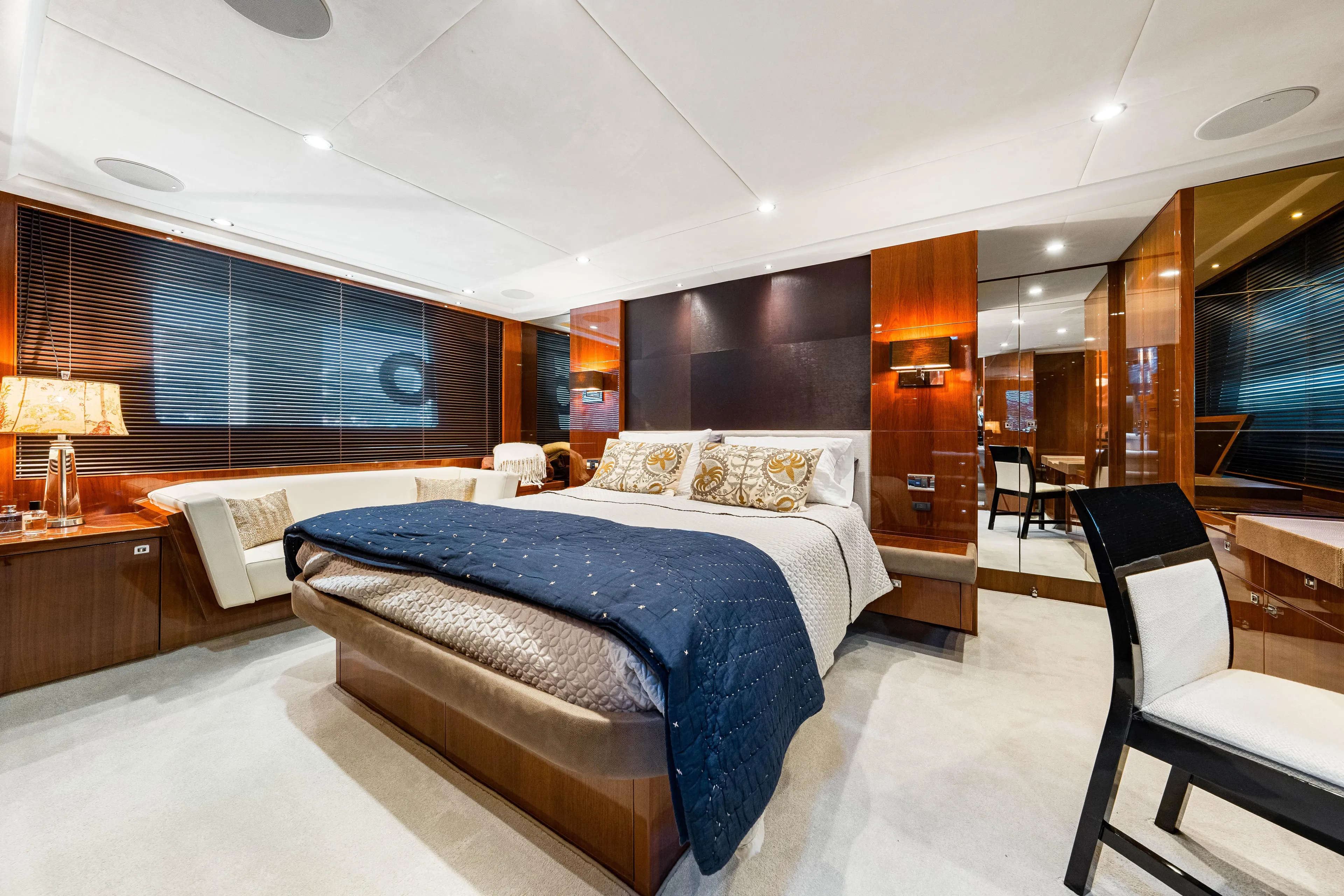 Fortunato Yacht Photos Pics Luxurious bedroom interior on 2014 Princess Y72 yacht, featuring elegant decor and modern furnishings.