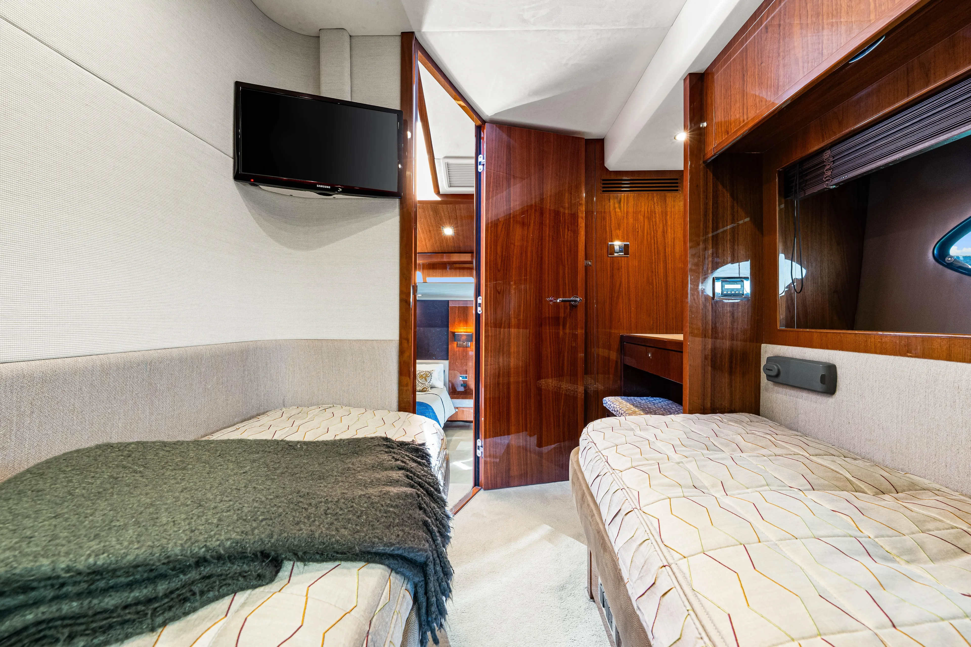 Fortunato Yacht Photos Pics Luxurious 2014 Princess Y72 yacht cabin with twin beds and modern amenities.