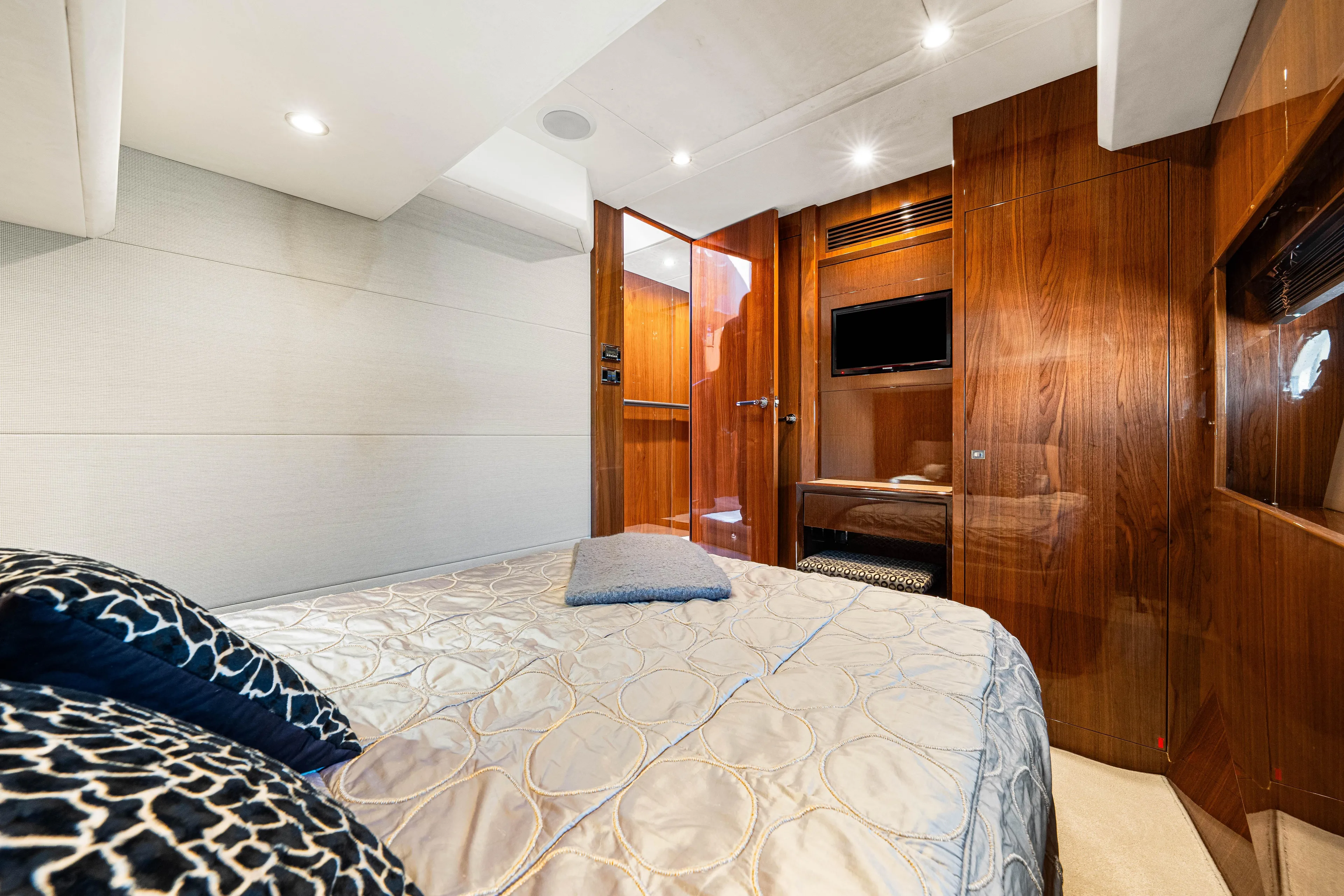 Fortunato Yacht Photos Pics Luxurious cabin interior of 2014 Princess Y72 yacht with elegant wood finishes.