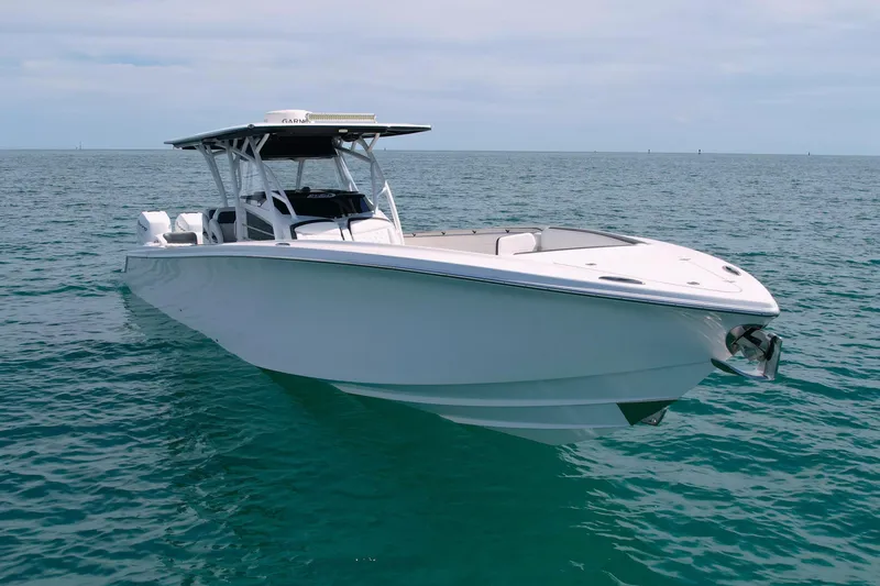  Yacht Photos Pics 2019 Nor-Tech 390 Sport Center Console boat on calm ocean waters.