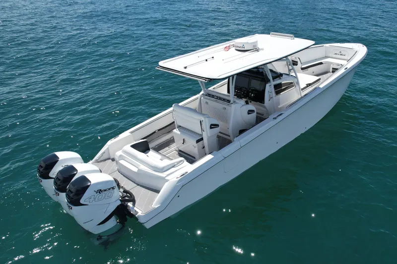 Yacht Photos Pics 2019 Nor-Tech 390 Sport Center Console boat on clear blue water.