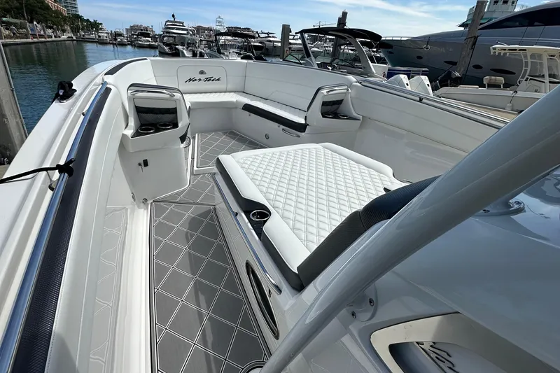  Yacht Photos Pics 2019 Nor-Tech 390 Sport Center Console boat interior with luxurious seating and sleek design.