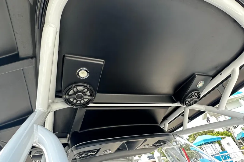  Yacht Photos Pics 2019 Nor-Tech 390 Sport Center Console boat with speakers and lighting on the canopy.