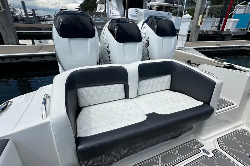  Yacht Photos Pics 2019 Nor-Tech 390 Sport Center Console with triple outboard engines and luxurious seating.