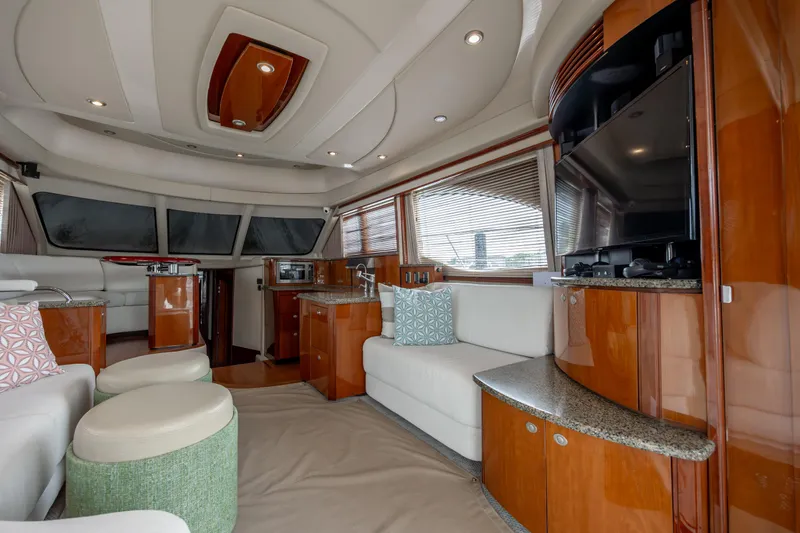 Beautiful Blue Yacht Photos Pics Luxurious interior of 2008 Sea Ray 52 Sedan Bridge yacht with modern furnishings.