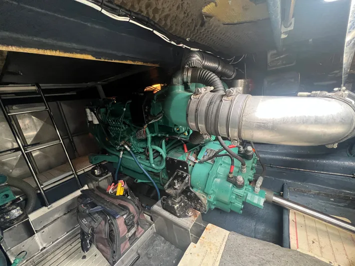  Yacht Photos Pics Engine room of a 2004 Cranchi Atlantique 48 yacht, featuring a powerful marine engine.