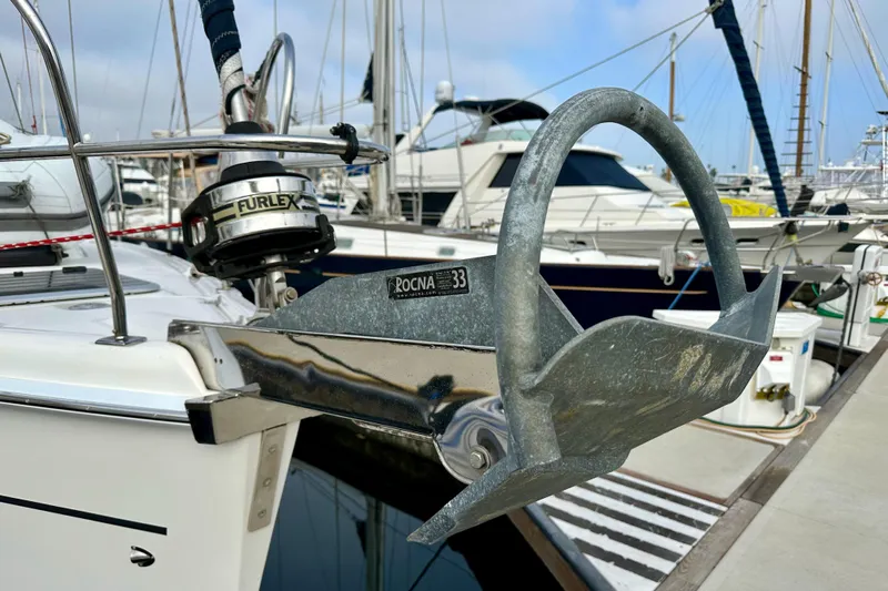 Dasananas Yacht Photos Pics Close-up of a 2008 Hunter 49 sailboat anchor and Furlex system at a marina.