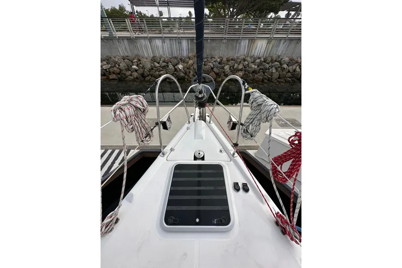 Dasananas Yacht Photos Pics Deck view of a 2008 Hunter 49 sailboat with ropes and hatch.