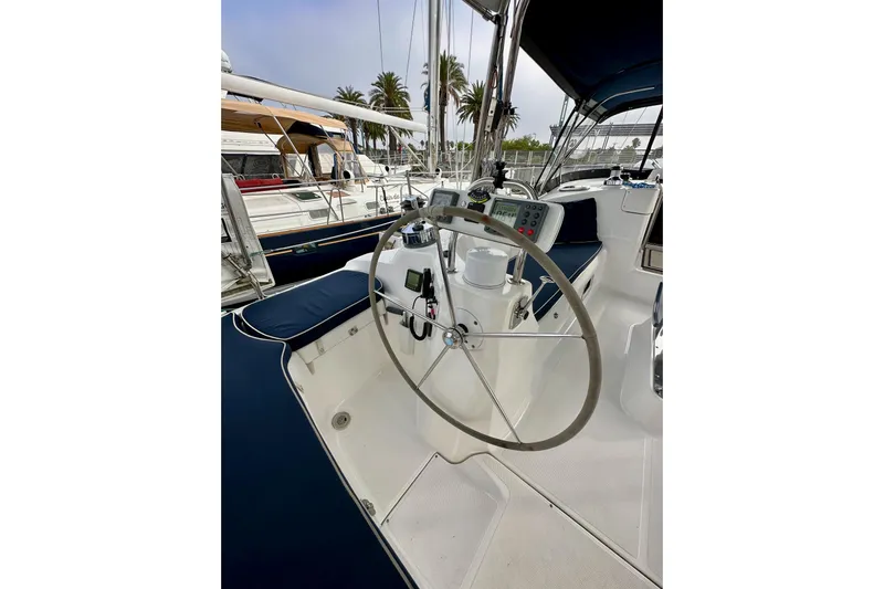 Dasananas Yacht Photos Pics Cockpit of 2008 Hunter 49 sailboat with steering wheel and navigation instruments.
