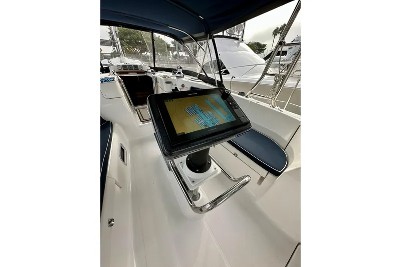 Dasananas Yacht Photos Pics Cockpit of 2008 Hunter 49 sailboat with navigation display and seating.