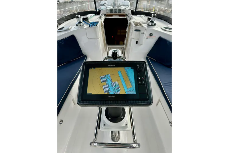 Dasananas Yacht Photos Pics Cockpit of 2008 Hunter 49 yacht with navigation display and seating.