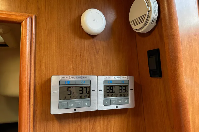 Dasananas Yacht Photos Pics Control panel and sensors on 2008 Hunter 49 wooden interior wall.