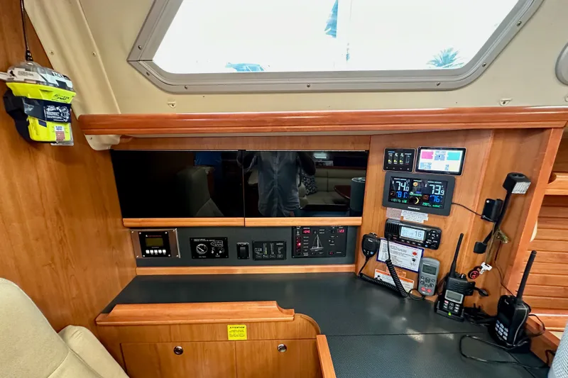 Dasananas Yacht Photos Pics Control panel of a 2008 Hunter 49 yacht with navigation and communication equipment.
