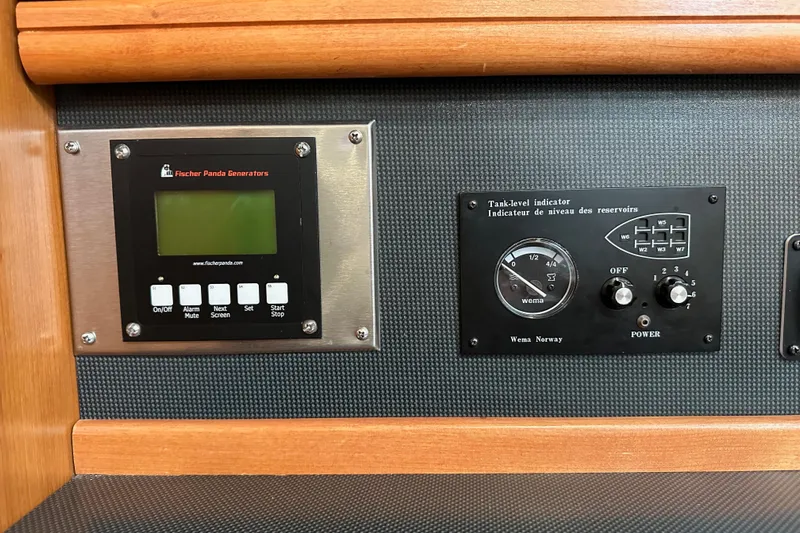 Dasananas Yacht Photos Pics Control panel of a 2008 Hunter 49 yacht with generator and tank-level indicators.