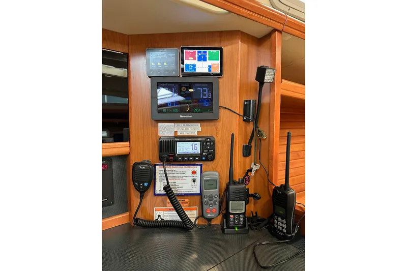 Dasananas Yacht Photos Pics Control panel of a 2008 Hunter 49 yacht with communication devices and navigation instruments.