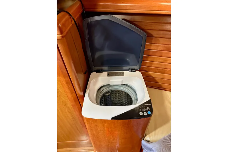 Dasananas Yacht Photos Pics Compact washing machine in a 2008 Hunter 49 yacht interior.