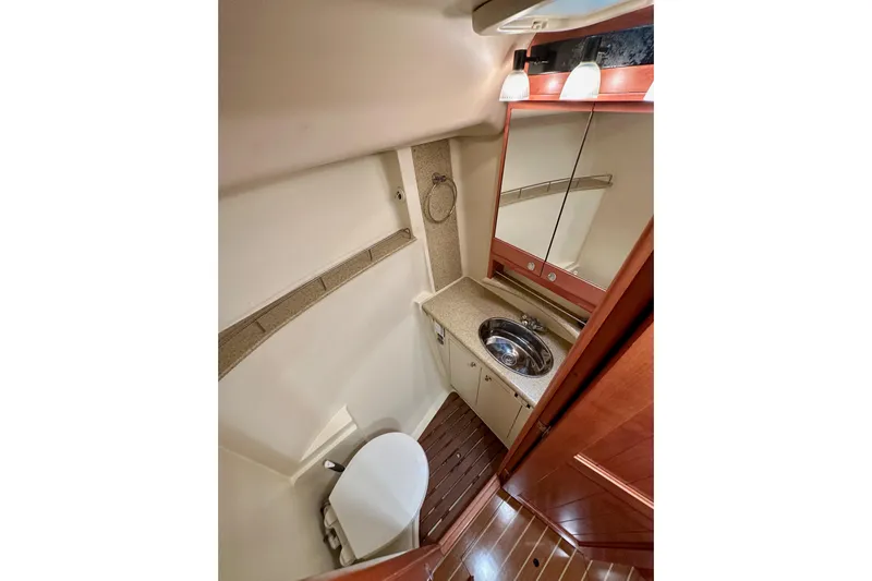 Dasananas Yacht Photos Pics 2008 Hunter 49 yacht bathroom with sink, mirror, and toilet.